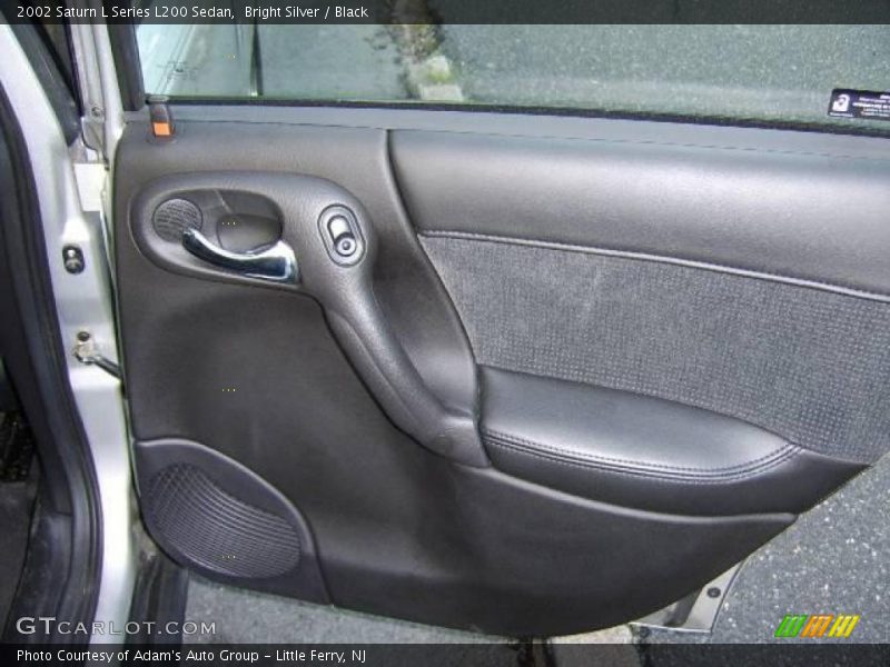 Bright Silver / Black 2002 Saturn L Series L200 Sedan