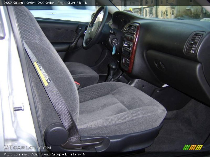 Bright Silver / Black 2002 Saturn L Series L200 Sedan