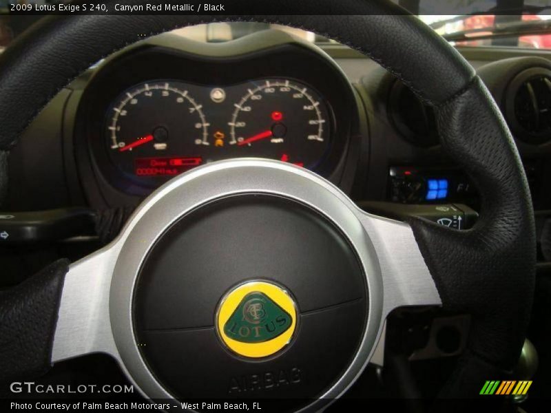 Canyon Red Metallic / Black 2009 Lotus Exige S 240