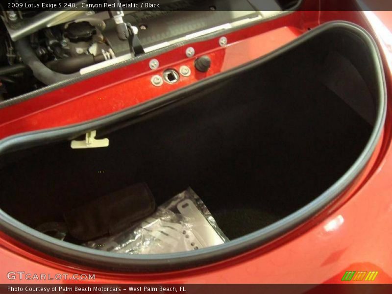 Canyon Red Metallic / Black 2009 Lotus Exige S 240