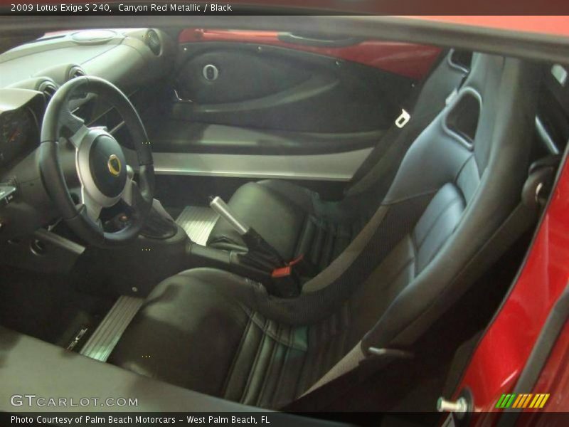 Canyon Red Metallic / Black 2009 Lotus Exige S 240