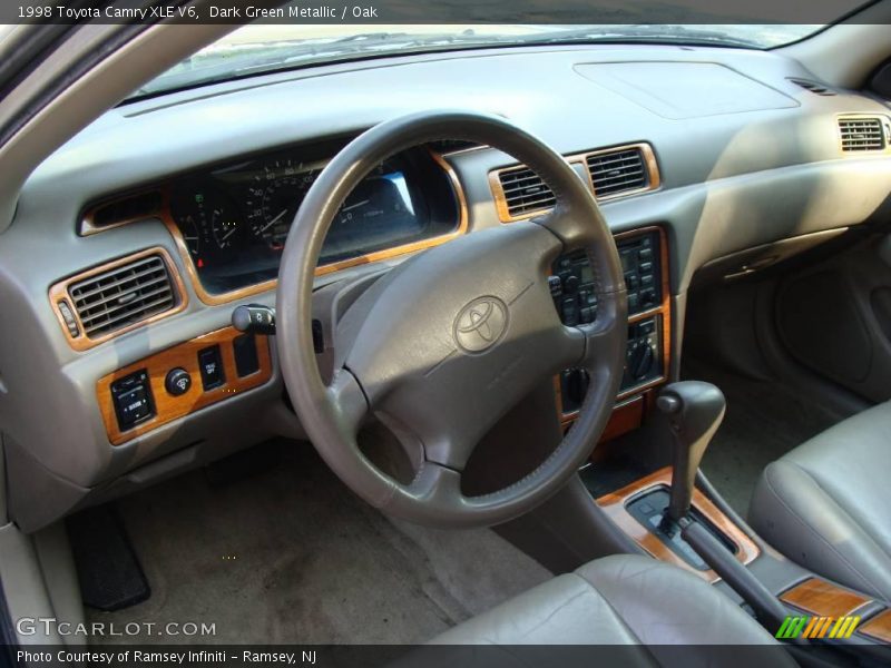 Dark Green Metallic / Oak 1998 Toyota Camry XLE V6