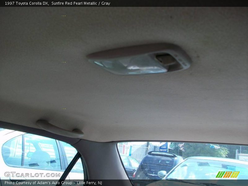 Sunfire Red Pearl Metallic / Gray 1997 Toyota Corolla DX