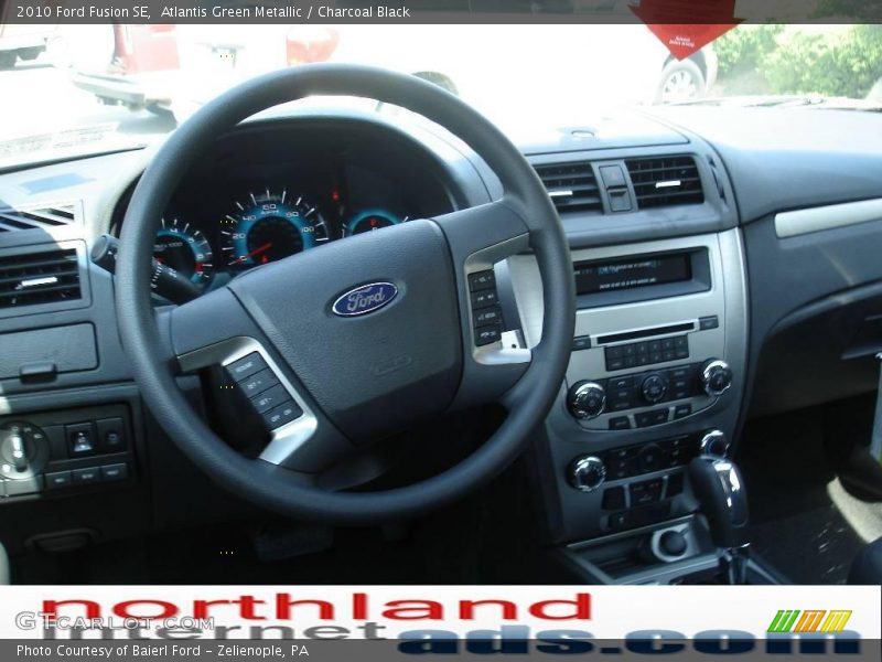 Atlantis Green Metallic / Charcoal Black 2010 Ford Fusion SE