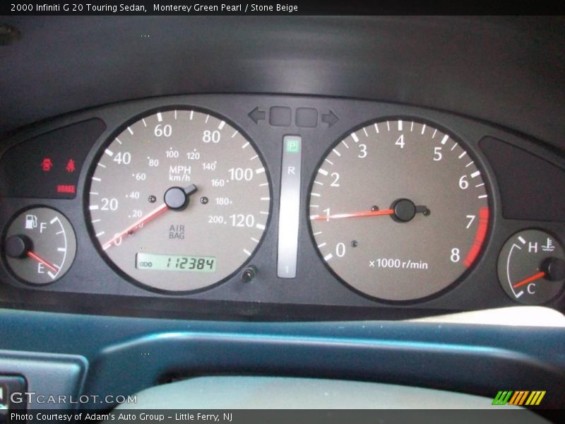Monterey Green Pearl / Stone Beige 2000 Infiniti G 20 Touring Sedan