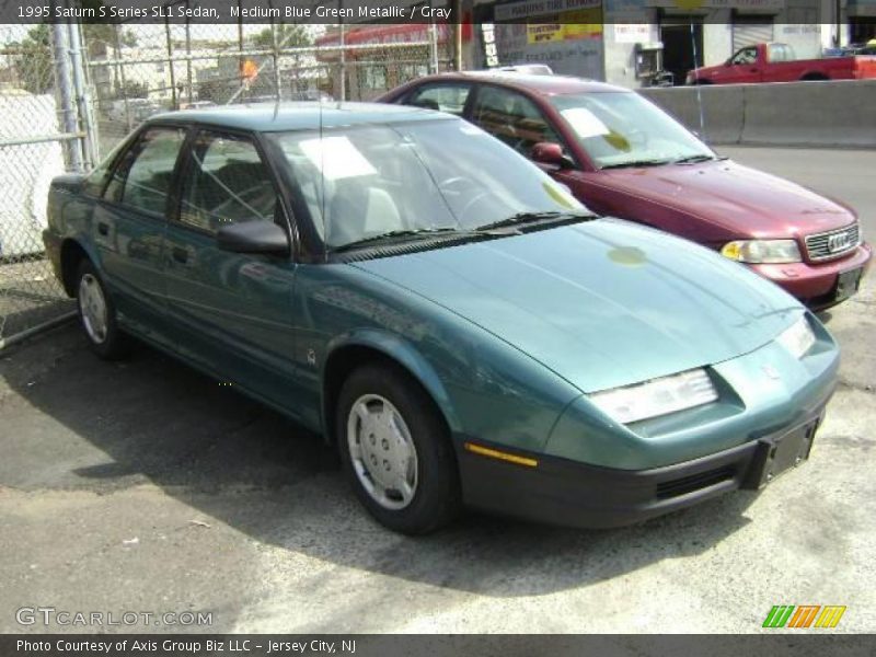 Medium Blue Green Metallic / Gray 1995 Saturn S Series SL1 Sedan