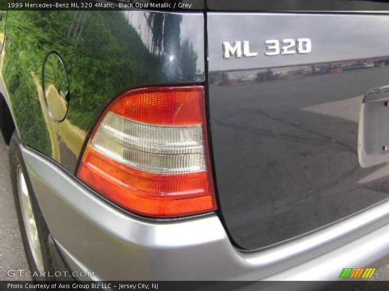 Black Opal Metallic / Grey 1999 Mercedes-Benz ML 320 4Matic