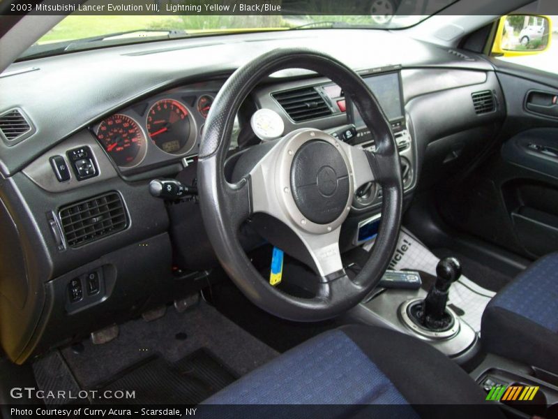 Lightning Yellow / Black/Blue 2003 Mitsubishi Lancer Evolution VIII