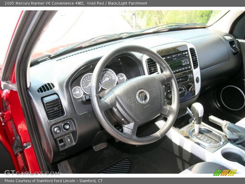 Vivid Red / Black/Light Parchment 2005 Mercury Mariner V6 Convenience 4WD