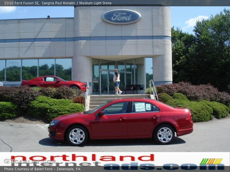 Sangria Red Metallic / Medium Light Stone 2010 Ford Fusion SE