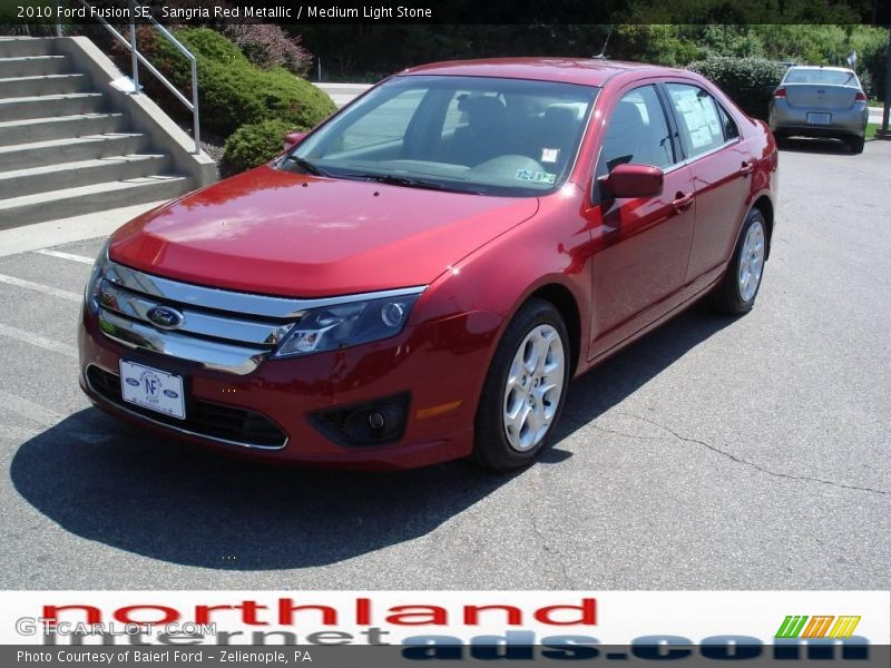 Sangria Red Metallic / Medium Light Stone 2010 Ford Fusion SE