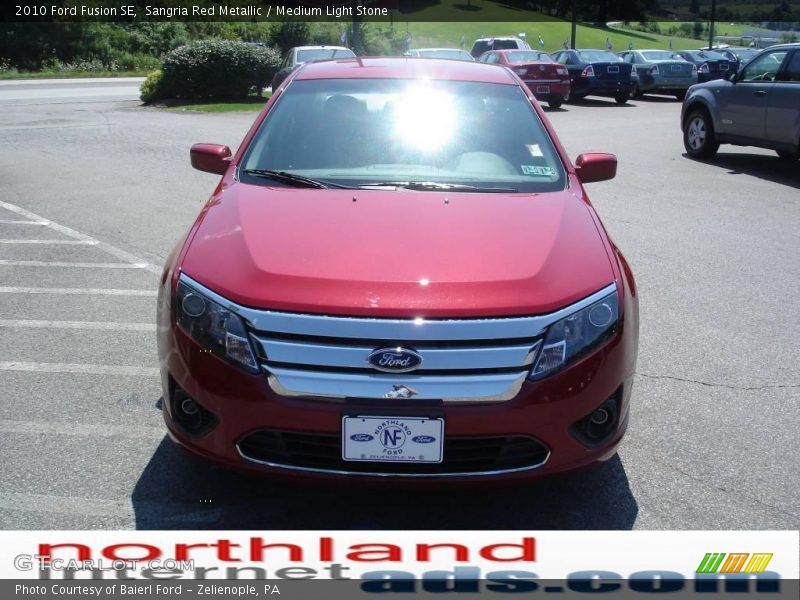 Sangria Red Metallic / Medium Light Stone 2010 Ford Fusion SE