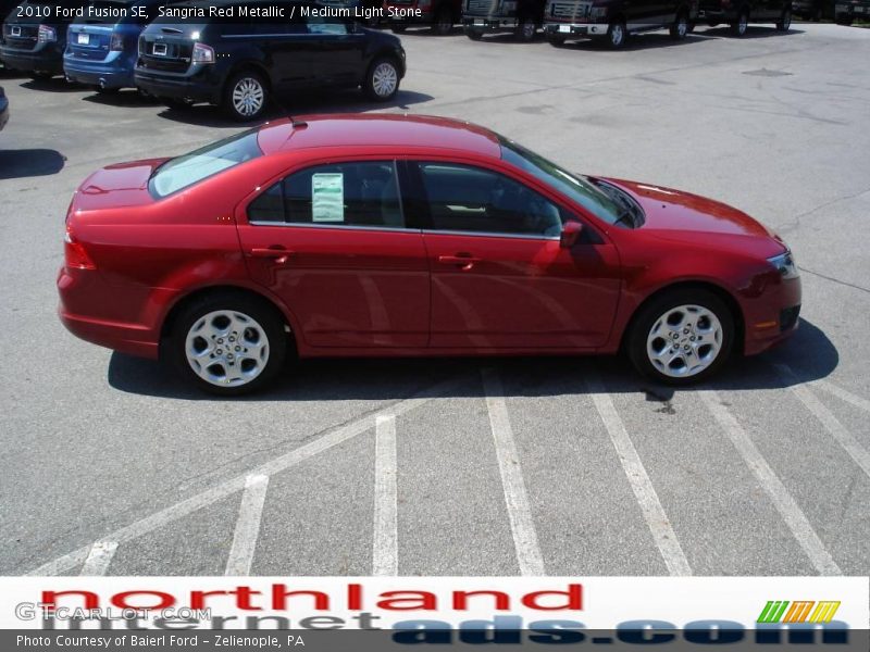 Sangria Red Metallic / Medium Light Stone 2010 Ford Fusion SE