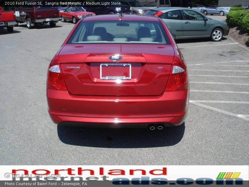 Sangria Red Metallic / Medium Light Stone 2010 Ford Fusion SE