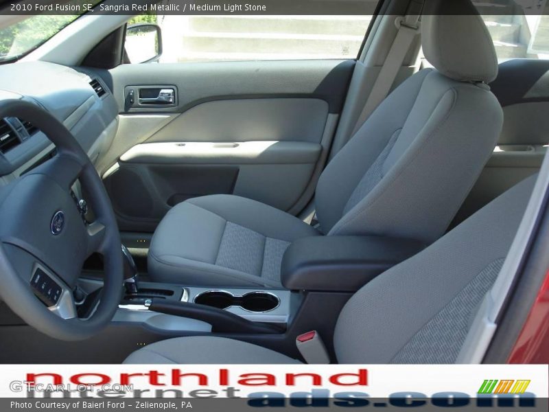 Sangria Red Metallic / Medium Light Stone 2010 Ford Fusion SE