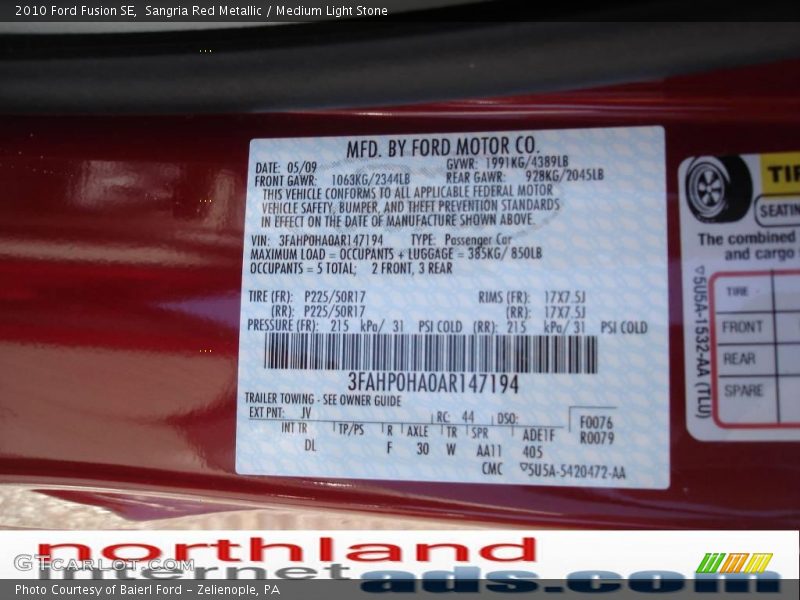 Sangria Red Metallic / Medium Light Stone 2010 Ford Fusion SE