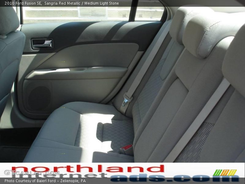 Sangria Red Metallic / Medium Light Stone 2010 Ford Fusion SE
