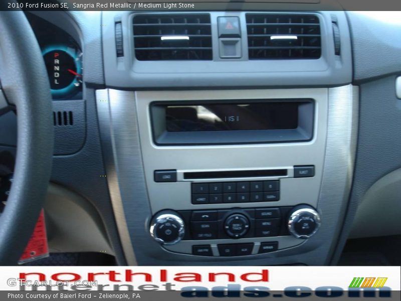 Sangria Red Metallic / Medium Light Stone 2010 Ford Fusion SE