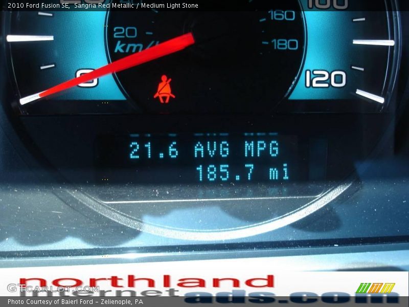 Sangria Red Metallic / Medium Light Stone 2010 Ford Fusion SE
