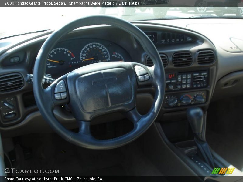 Champagne Beige Metallic / Dark Taupe 2000 Pontiac Grand Prix SE Sedan