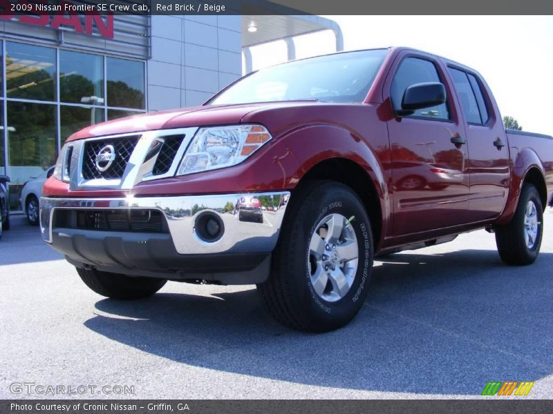 Red Brick / Beige 2009 Nissan Frontier SE Crew Cab