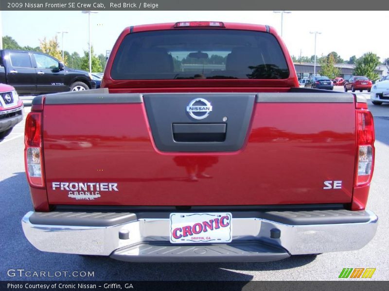 Red Brick / Beige 2009 Nissan Frontier SE Crew Cab