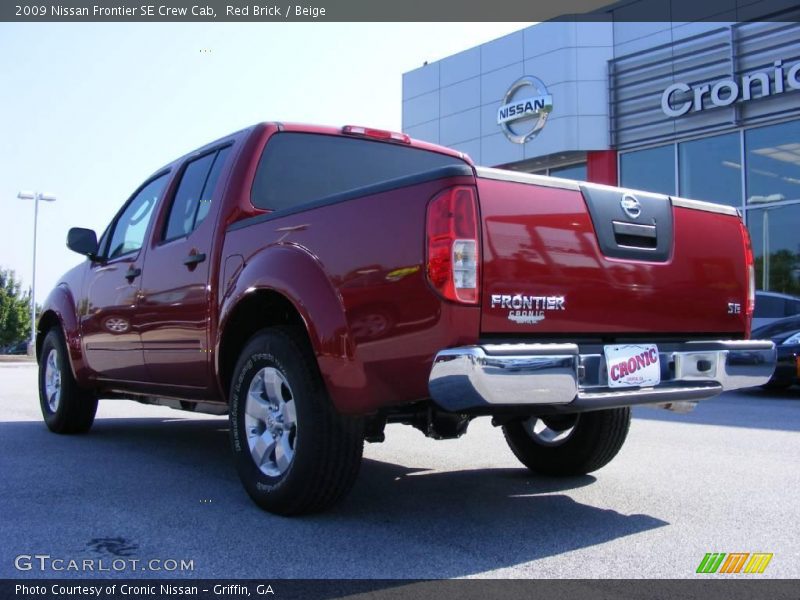 Red Brick / Beige 2009 Nissan Frontier SE Crew Cab