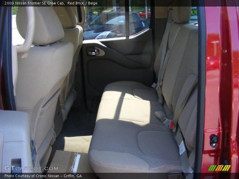 Red Brick / Beige 2009 Nissan Frontier SE Crew Cab