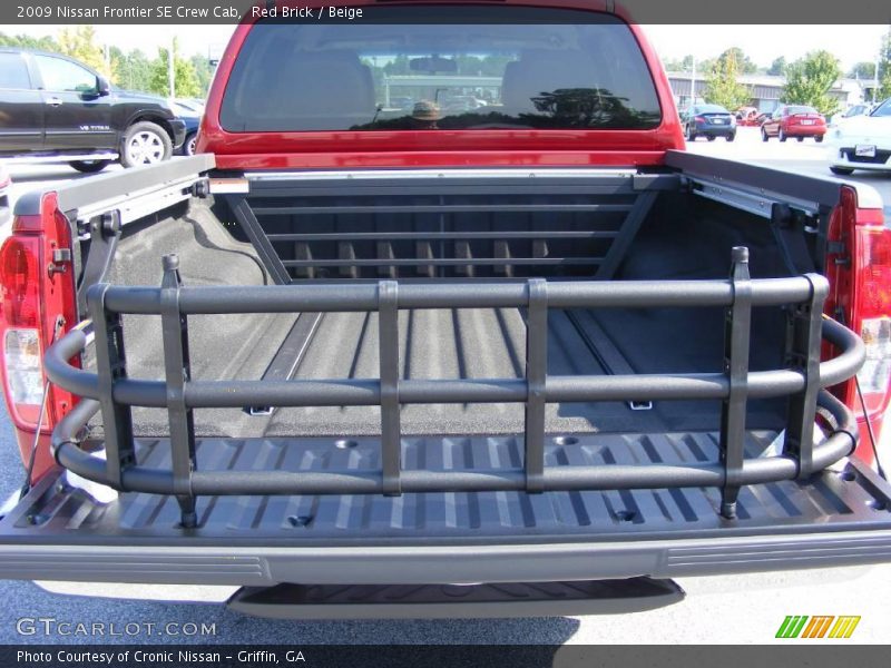 Red Brick / Beige 2009 Nissan Frontier SE Crew Cab