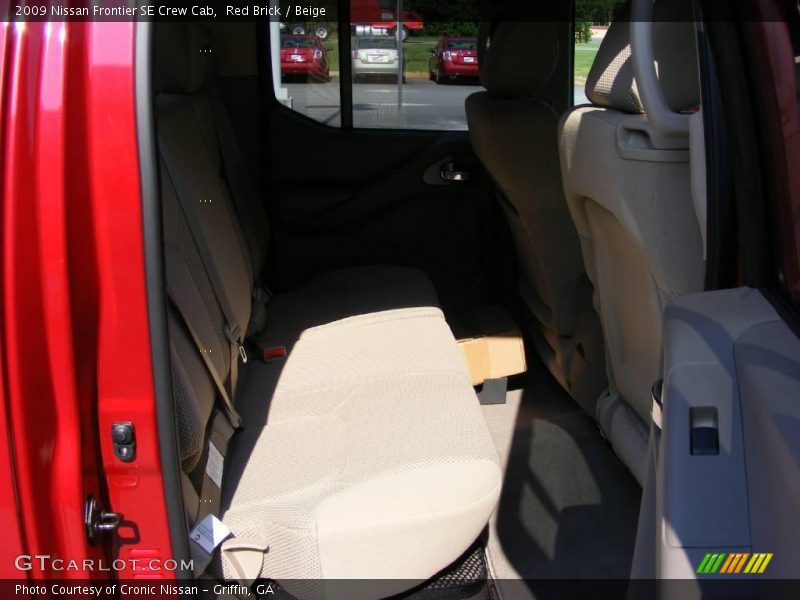Red Brick / Beige 2009 Nissan Frontier SE Crew Cab