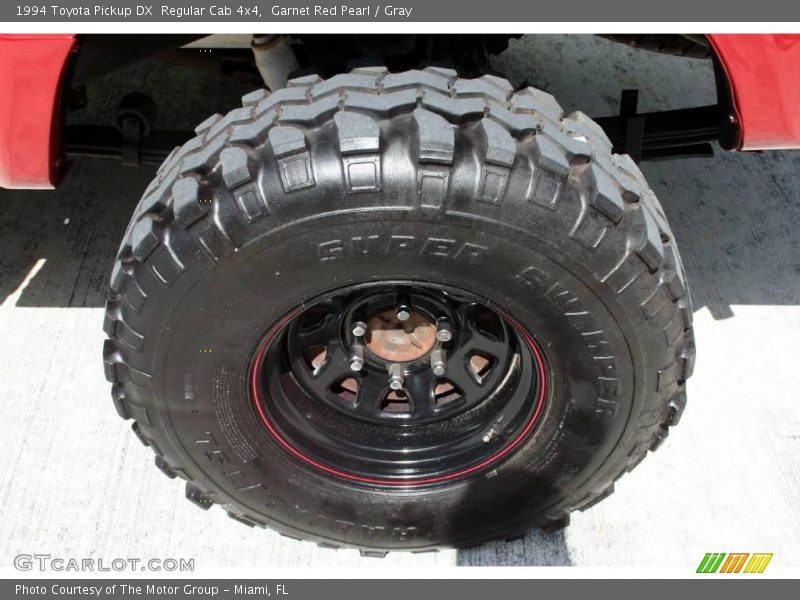 Garnet Red Pearl / Gray 1994 Toyota Pickup DX  Regular Cab 4x4