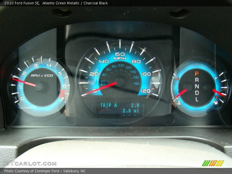 Atlantis Green Metallic / Charcoal Black 2010 Ford Fusion SE