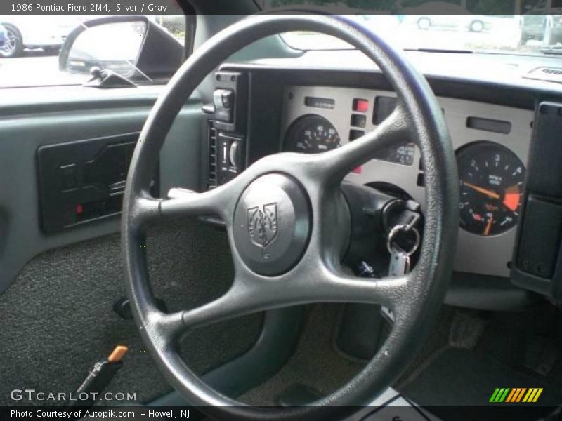 Silver / Gray 1986 Pontiac Fiero 2M4