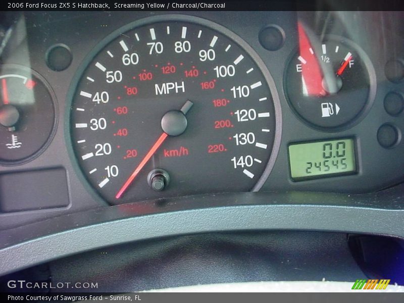 Screaming Yellow / Charcoal/Charcoal 2006 Ford Focus ZX5 S Hatchback