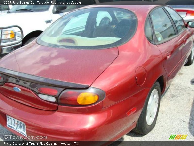 Toreador Red Metallic / Saddle 1997 Ford Taurus GL