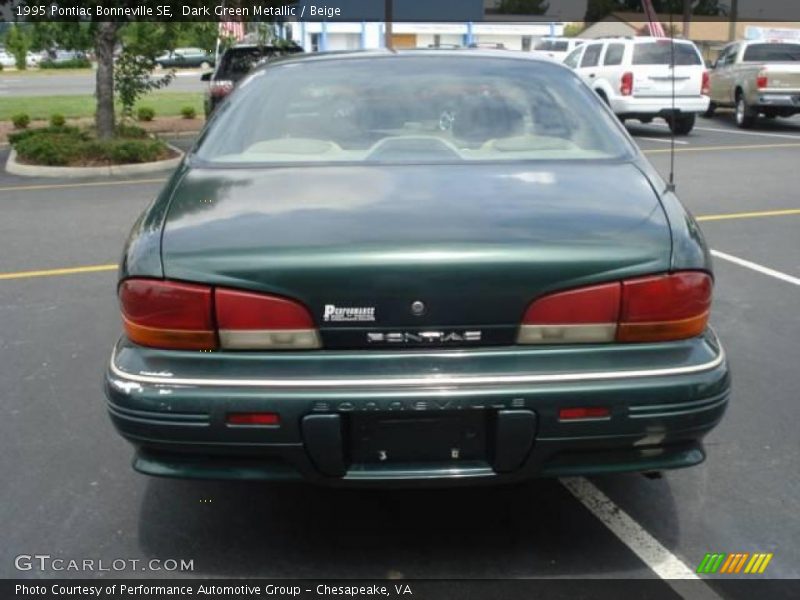 Dark Green Metallic / Beige 1995 Pontiac Bonneville SE