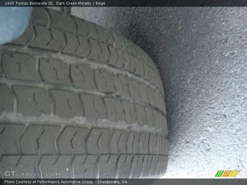 Dark Green Metallic / Beige 1995 Pontiac Bonneville SE
