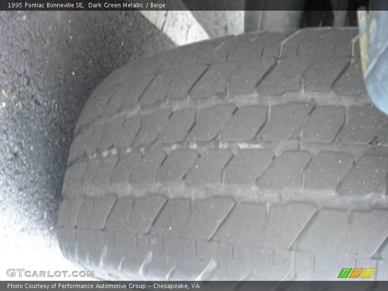 Dark Green Metallic / Beige 1995 Pontiac Bonneville SE