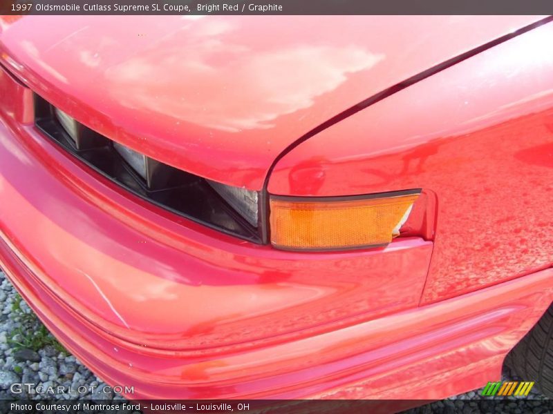 Bright Red / Graphite 1997 Oldsmobile Cutlass Supreme SL Coupe
