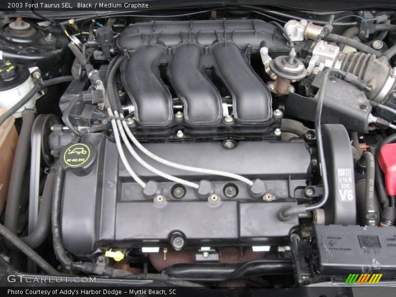 Black / Medium Graphite 2003 Ford Taurus SEL