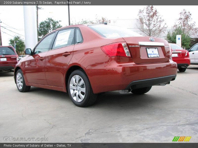 Paprika Red Pearl / Ivory 2009 Subaru Impreza 2.5i Sedan