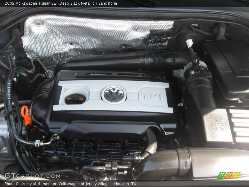 Deep Black Metallic / Sandstone 2009 Volkswagen Tiguan SE
