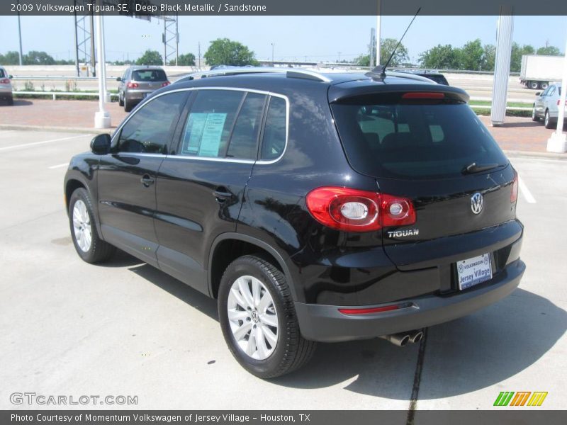 Deep Black Metallic / Sandstone 2009 Volkswagen Tiguan SE