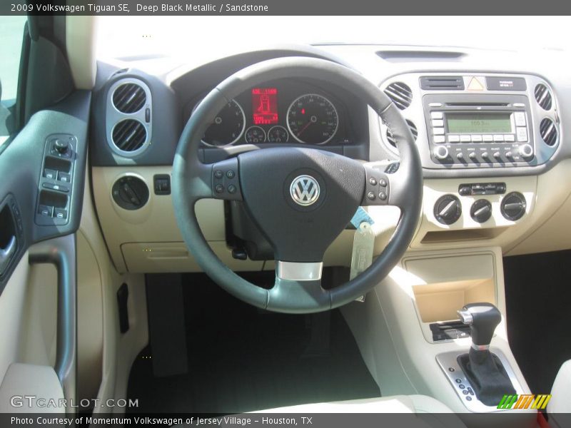 Deep Black Metallic / Sandstone 2009 Volkswagen Tiguan SE