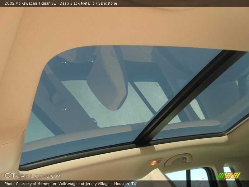 Deep Black Metallic / Sandstone 2009 Volkswagen Tiguan SE