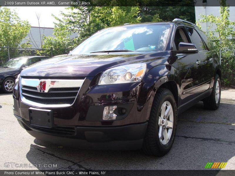 Garnet Red / Black 2009 Saturn Outlook XR AWD