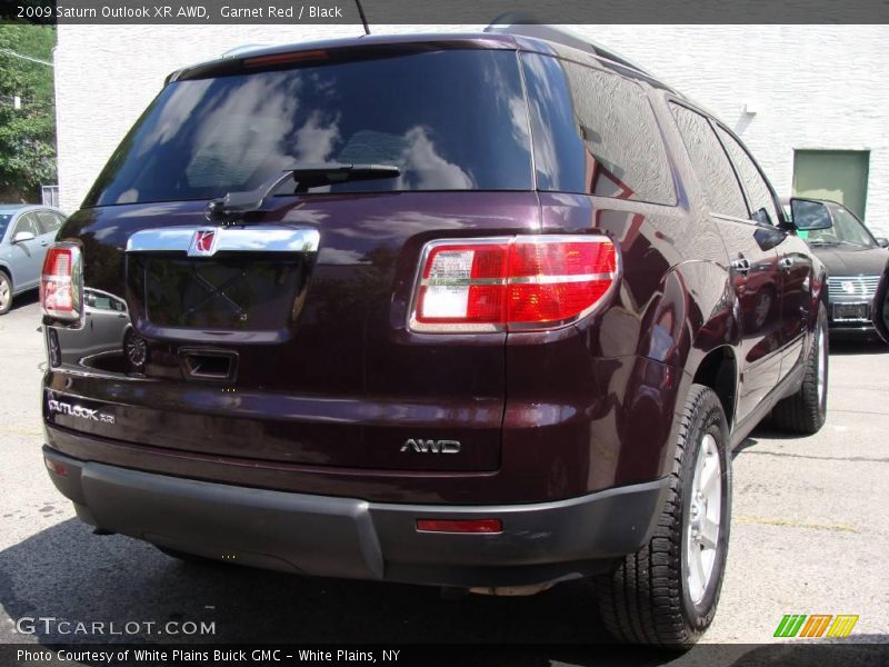 Garnet Red / Black 2009 Saturn Outlook XR AWD