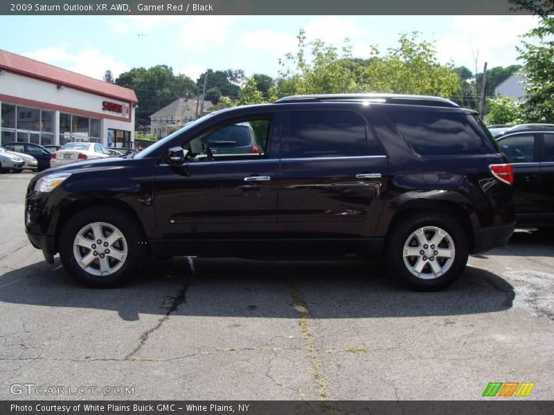Garnet Red / Black 2009 Saturn Outlook XR AWD