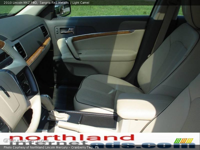 Sangria Red Metallic / Light Camel 2010 Lincoln MKZ FWD