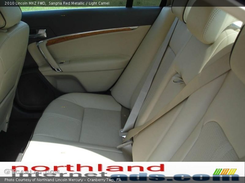 Sangria Red Metallic / Light Camel 2010 Lincoln MKZ FWD